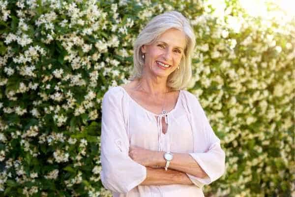 Older woman happy with urinary incontinence treatment Surrey